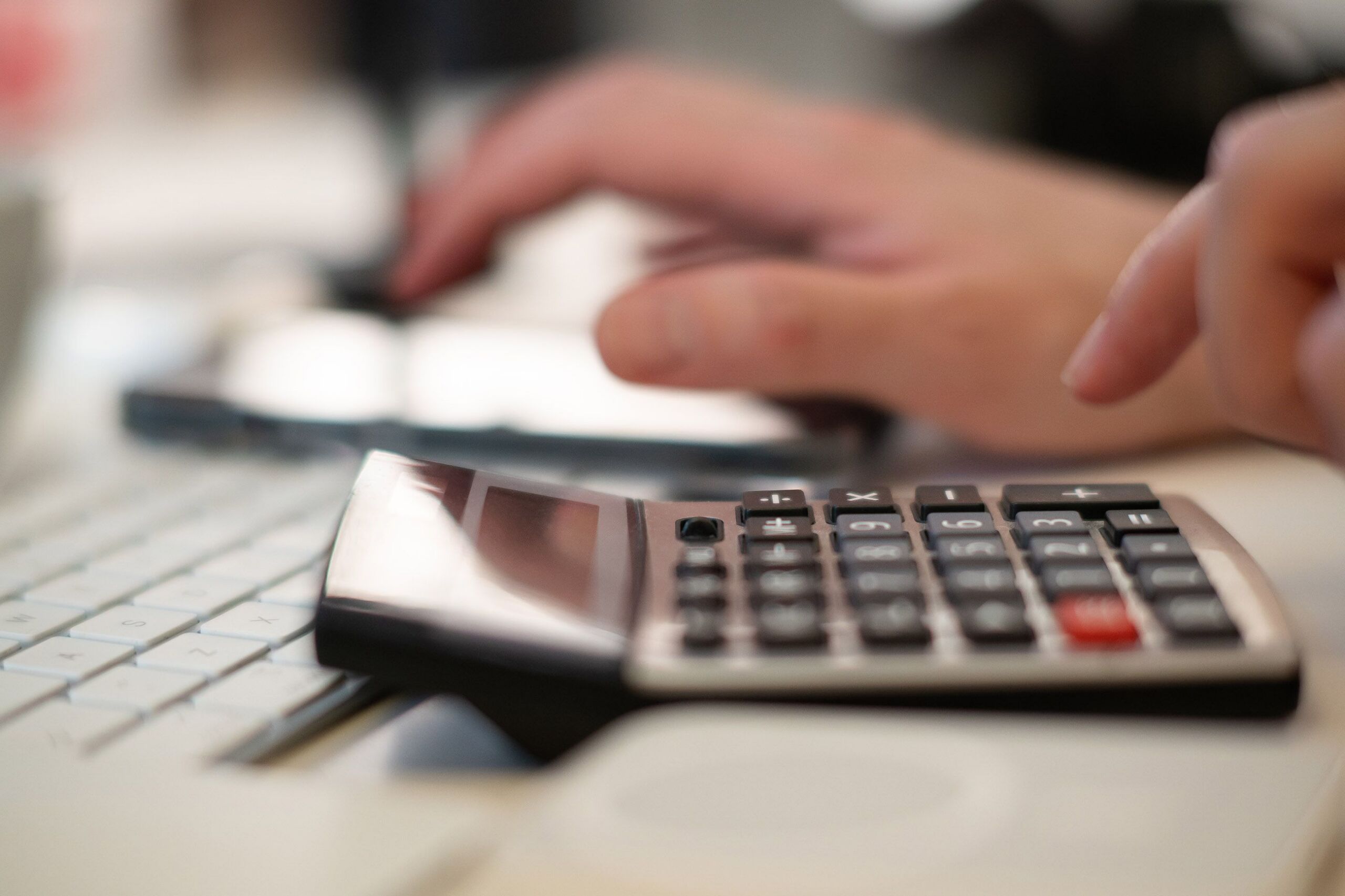 a person using a calculator